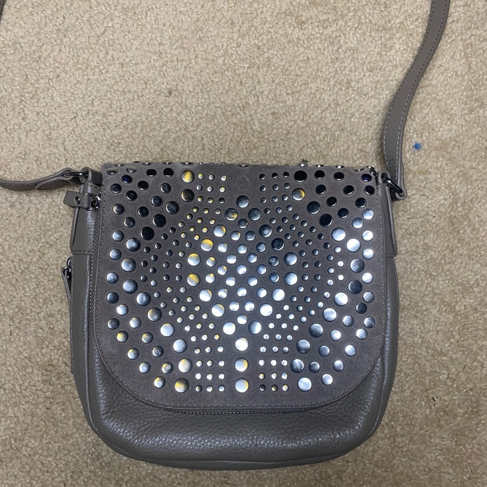VINCE CAMUTO studded crossbody bag.
